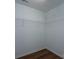 Walk-in closet with modern shelving for optimal storage and organization at 2684 Sunberry Nw Ln, Concord, NC 28027