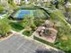 Aerial view featuring a community playground and tennis courts in a residential area at 2684 Sunberry Nw Ln, Concord, NC 28027