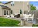 A concrete patio with outdoor furniture provides a comfortable gathering space at 3039 Keswick Ter, Indian Land, SC 29707