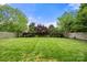 View of a meticulously maintained lawn enclosed by a wooden privacy fence at 3039 Keswick Ter, Indian Land, SC 29707