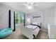 Bright bedroom featuring paneled walls, and large window that provides natural light, creating a calm atmosphere at 3039 Keswick Ter, Indian Land, SC 29707