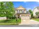 Charming two-story home with stone accents, a well-manicured lawn, and a spacious two-car garage at 3039 Keswick Ter, Indian Land, SC 29707