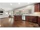 Open-concept living space featuring hardwood floors and a view of the backyard at 3039 Keswick Ter, Indian Land, SC 29707