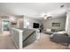 Upstairs loft area with neutral carpet, and a comfortable couch and furnishings at 3039 Keswick Ter, Indian Land, SC 29707