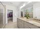 Elegant bathroom boasts double sinks, granite countertop, and a glass-enclosed shower at 3129 Burnello Ct, Iron Station, NC 28080