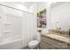 Bathroom with a granite countertop vanity, toilet, and bathtub with a shower at 3129 Burnello Ct, Iron Station, NC 28080