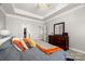 Comfortable primary bedroom with a dresser and an ensuite bathroom at 3129 Burnello Ct, Iron Station, NC 28080