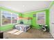 Vibrant bedroom features a bunk bed, playful decor, and ample natural light, creating a fun and functional space at 3129 Burnello Ct, Iron Station, NC 28080