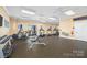 Well-equipped gym offers various machines for a comprehensive fitness routine and ceiling fans at 3129 Burnello Ct, Iron Station, NC 28080