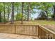 Enjoy outdoor living on this wooden deck overlooking a lush, green backyard at 313 Villa St, Kannapolis, NC 28083