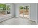 Bedroom featuring sliding glass door to back deck, and windows at 313 Villa St, Kannapolis, NC 28083