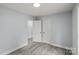 Bedroom featuring modern floors, neutral wall color, and closet at 313 Villa St, Kannapolis, NC 28083