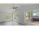 Bright living room boasts high ceilings, large windows, and modern flooring, offering a welcoming and airy space at 313 Villa St, Kannapolis, NC 28083
