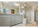 Bathroom with a granite countertop vanity, a large mirror, and a glass-enclosed shower with a built-in seat at 3216 Moss Ln, Charlotte, NC 28206