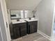 This bathroom features dual vanity sinks, and updated fixtures at 3824 Freedom Dr, Charlotte, NC 28208