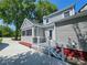 Charming home with a cozy sunroom and well-kept exterior features at 3824 Freedom Dr, Charlotte, NC 28208