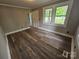 Bright room with new floors, showcasing a clean and modern aesthetic at 3824 Freedom Dr, Charlotte, NC 28208