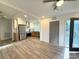 Open-concept kitchen featuring stainless steel appliances and hardwood floors at 401 Baker St, Gastonia, NC 28052