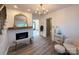Charming living room with fireplace, hardwood floors, and stylish decor at 401 Baker St, Gastonia, NC 28052