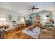 Inviting living room with hardwood floors, decorative accents, and comfortable seating arrangements at 4224 Firwood Ln, Charlotte, NC 28209