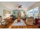 Living room featuring hardwood floors, stylish decor, and comfortable seating options at 4224 Firwood Ln, Charlotte, NC 28209