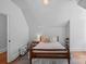Bedroom with neutral walls and carpet and a light fixture at 503 Walnut St, Davidson, NC 28036