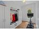 Mudroom with storage, a bench, hooks, cabinets and a window at 503 Walnut St, Davidson, NC 28036