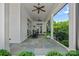 Covered porch with rocking chairs and ceiling fans, perfect for outdoor relaxation at 503 Walnut St, Davidson, NC 28036