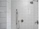 Walk-in shower with subway tile surround and polished chrome fixtures at 503 Walnut St, Davidson, NC 28036