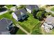 Aerial view of the home with expansive, green backyard and mature trees at 5035 Terrier Ln, Fort Mill, SC 29707