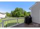 View of the house's back deck overlooking a green backyard at 5035 Terrier Ln, Fort Mill, SC 29707
