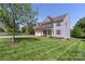 Beautiful two-story home with a well-maintained lawn and attractive landscaping at 5035 Terrier Ln, Fort Mill, SC 29707
