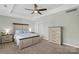 Elegant bedroom features a ceiling fan, neutral decor, and ample space with a dresser at 5035 Terrier Ln, Fort Mill, SC 29707
