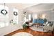Light-filled living room with hardwood floors, stylish furnishings, and elegant decor at 548 Fairwoods Dr, Huntersville, NC 28078