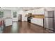 Bright kitchen with hardwood floors, stainless steel appliances, and wooden countertops at 5611 Hammermill Dr, Harrisburg, NC 28075