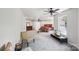 Spacious main bedroom with sitting area, ceiling fan, neutral walls and carpet at 5611 Hammermill Dr, Harrisburg, NC 28075