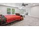 Large main bedroom features lots of natural light and a cozy seating area at 5611 Hammermill Dr, Harrisburg, NC 28075