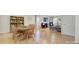 Elegant dining room with wood table, chairs, and seamless flow to living areas with hardwood floors at 599 Annalinde Ln, Rock Hill, SC 29732