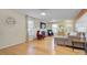 Bright living area showcases hardwood floors, a fireplace, and natural light, ideal for entertaining at 599 Annalinde Ln, Rock Hill, SC 29732