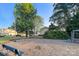 Community playground with swings, a bench, and trees, offering a recreational space at 599 Annalinde Ln, Rock Hill, SC 29732