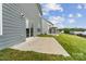 A concrete patio outside a siding home with a large yard at 6114 Alsace Ln, Indian Land, SC 29707