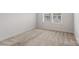 Bedroom with neutral carpet, bright windows, and white trim at 6114 Alsace Ln, Indian Land, SC 29707