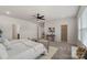 Spacious bedroom with a ceiling fan, neutral decor, and ample natural light at 6114 Alsace Ln, Indian Land, SC 29707