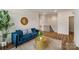 Cozy living room with modern furnishings, rug, and an adjacent staircase at 6114 Alsace Ln, Indian Land, SC 29707