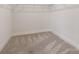 Spacious walk-in closet featuring carpeted floors and wire shelving for maximum storage at 6114 Alsace Ln, Indian Land, SC 29707