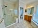 Bathroom featuring a glass enclosed shower, a soaking tub, and a separate toilet room at 6316 Glengarrie Ln, Huntersville, NC 28078