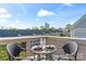 Outdoor dining with city views at 656 Garden District Dr, Charlotte, NC 28202