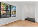 Clean and bright entryway features hardwood floors and a large window for natural light at 656 Garden District Dr, Charlotte, NC 28202