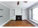 Light and airy living room with hardwood floors and a fireplace at 6701 Highbrook Dr, Charlotte, NC 28212