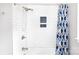 Shower features white subway tile, niche, and modern fixtures at 6701 Highbrook Dr, Charlotte, NC 28212